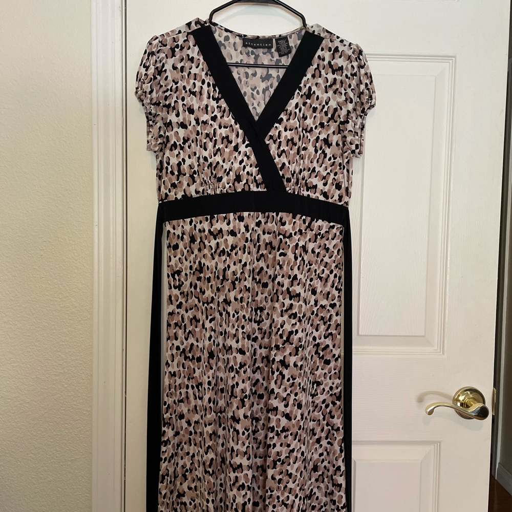 leopard spot and black trim dress